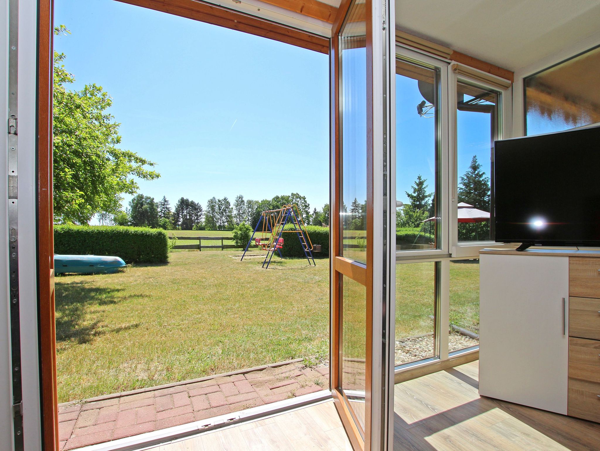 HOME Bungalow Nr. 13 - Aussicht aus dem Wintergarten