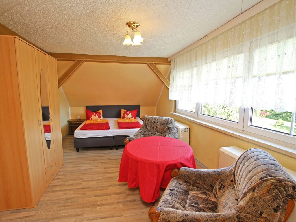 HOME Haus Watzkendorf - Ansicht Schlafzimmer Nr. 3 mit Schlafsofa