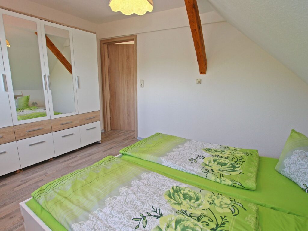 HOME Haus Watzkendorf - Ansicht Schlafzimmer Nr. 3 mit Doppelbett
